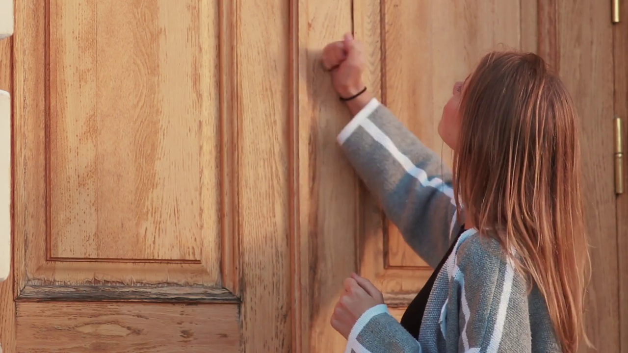 girl knocking on door