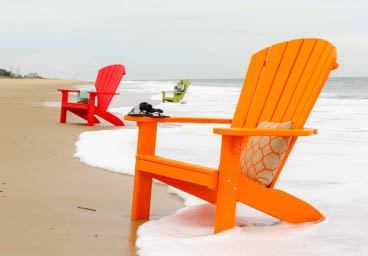 chairs along shore of ocean