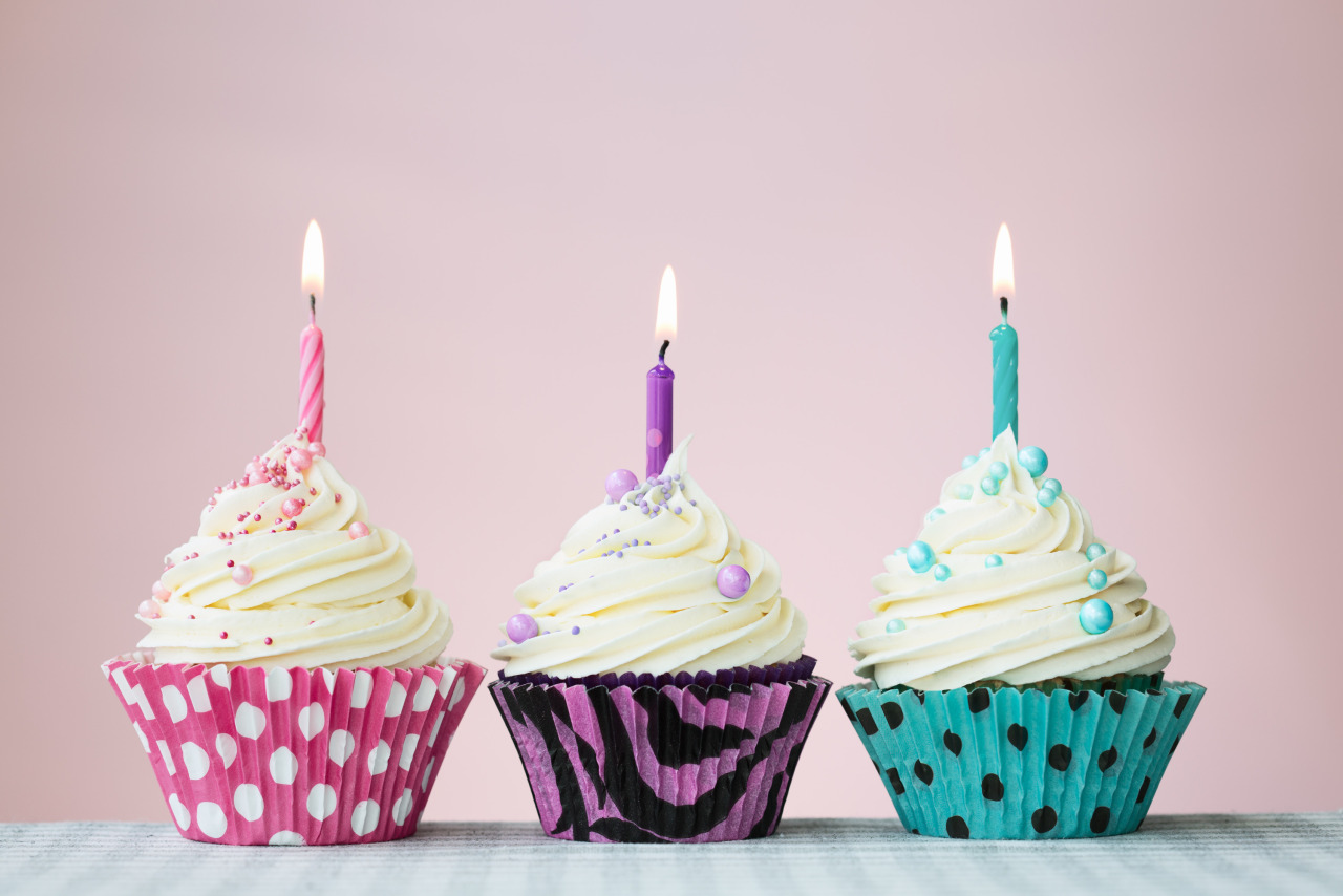 three fancy birthday cupcakes