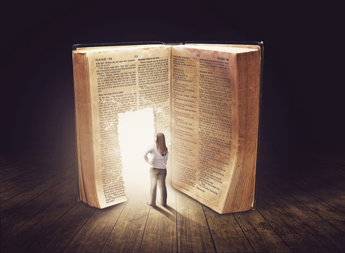 young teen girl walking through glowing door that's opened in a very large book