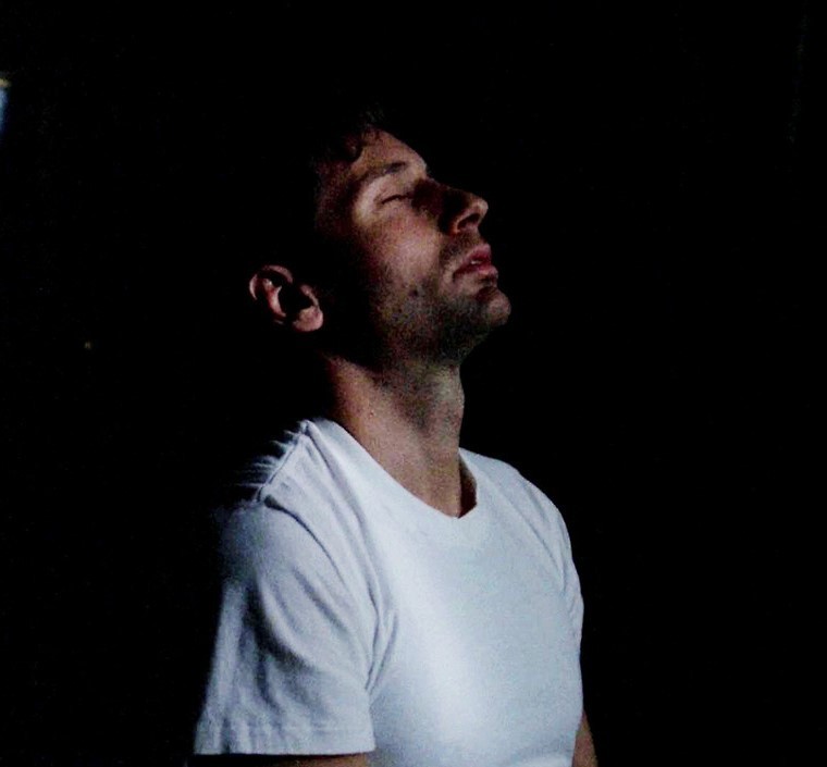 devestated Mulder throws head back